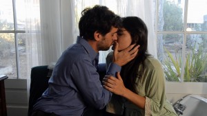 Thomas (Josh Breslow) and Amandine (Karen Sours) share a first kiss.